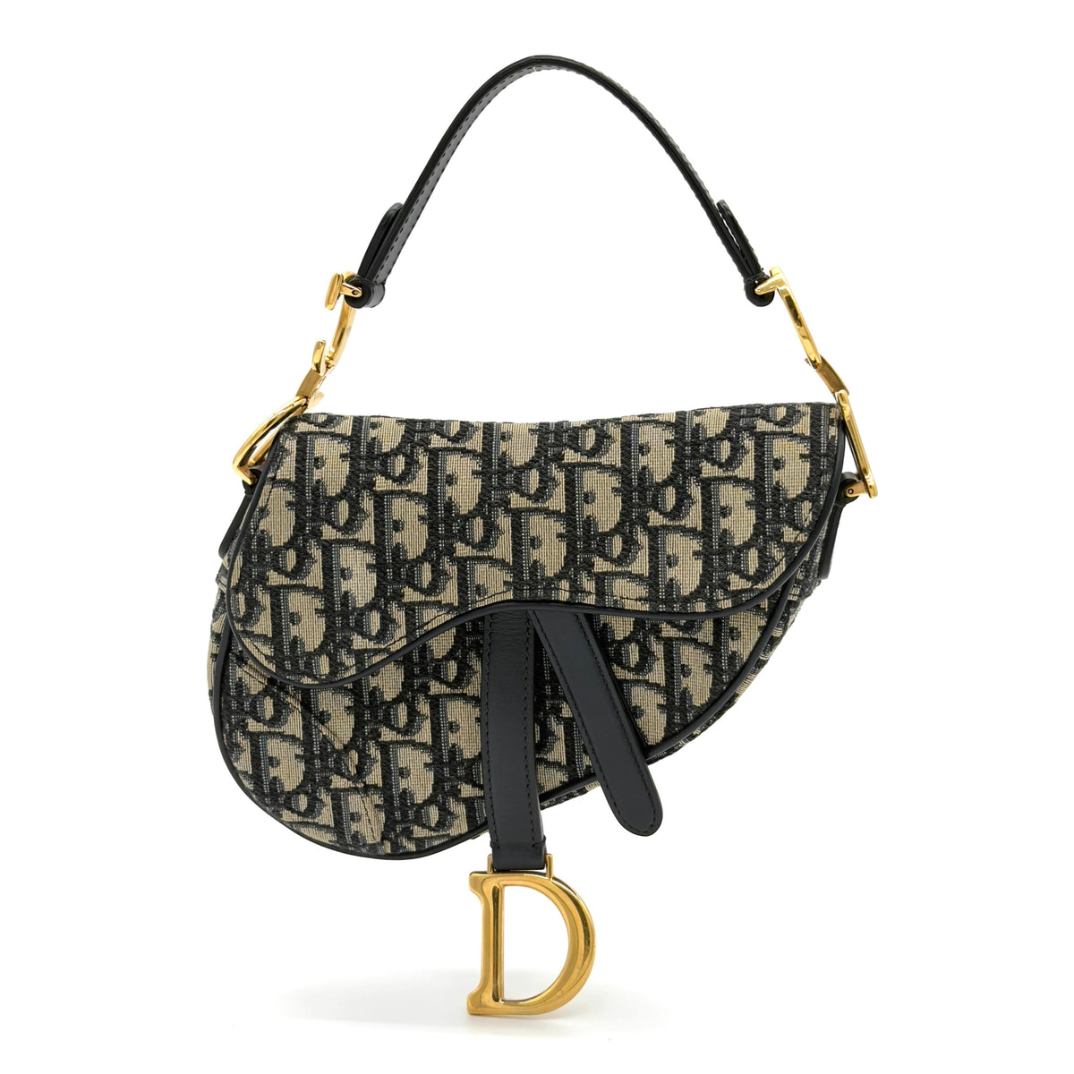 Designer handbag with monogram pattern and gold hardware on a white background
