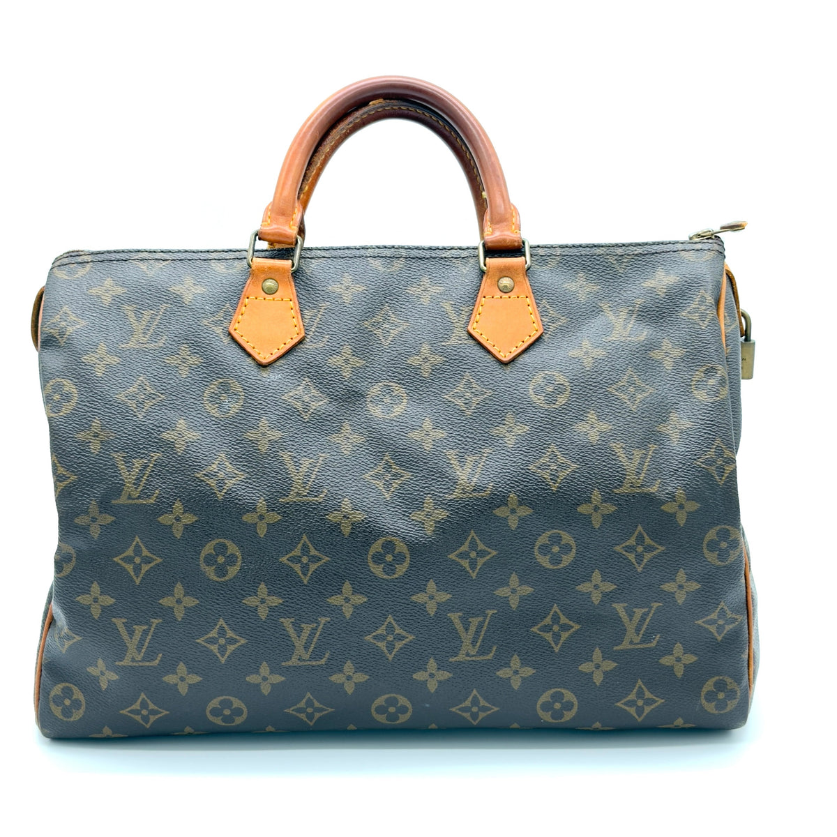 Designer handbag with monogram pattern on a white background
