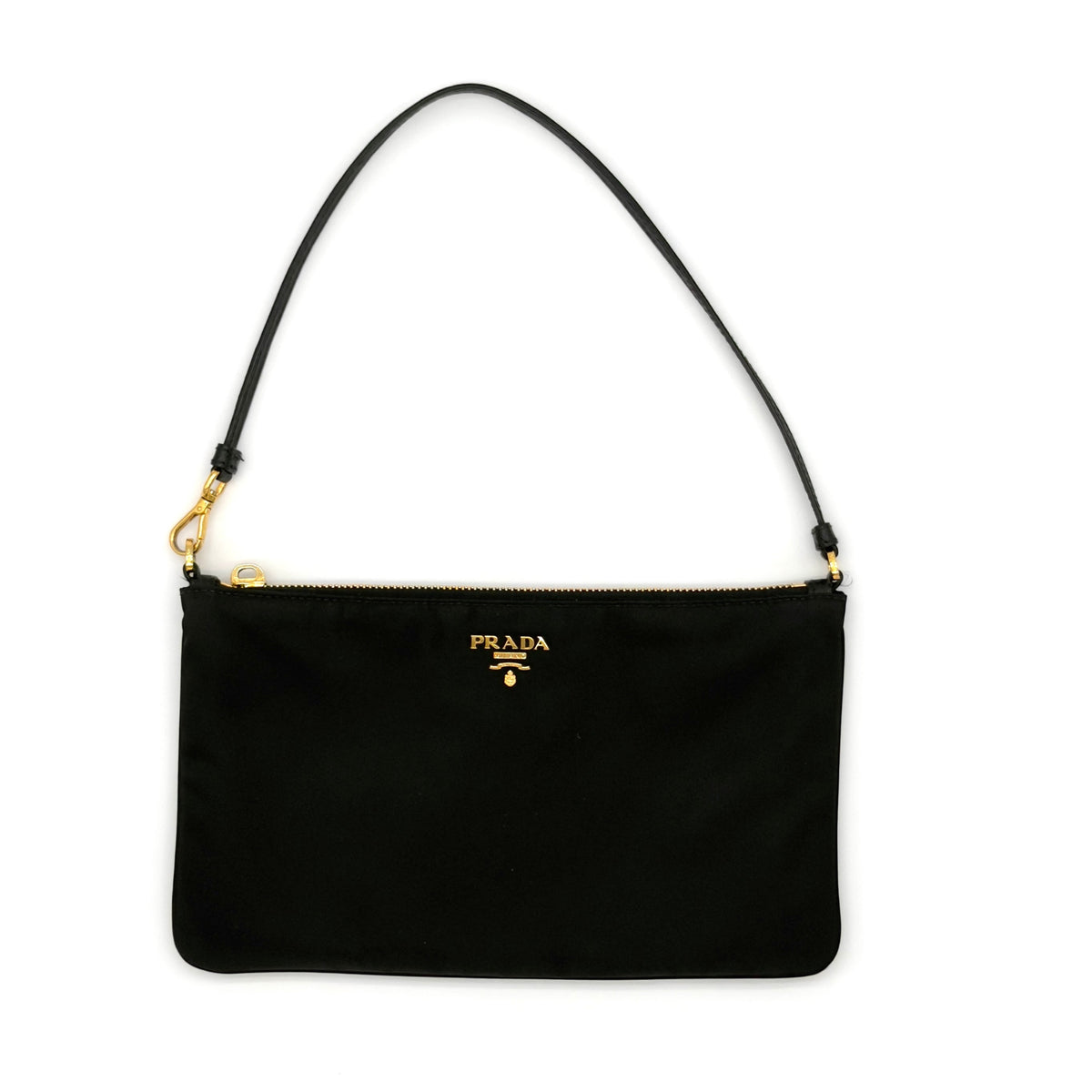 Black handbag with gold accents on a white background